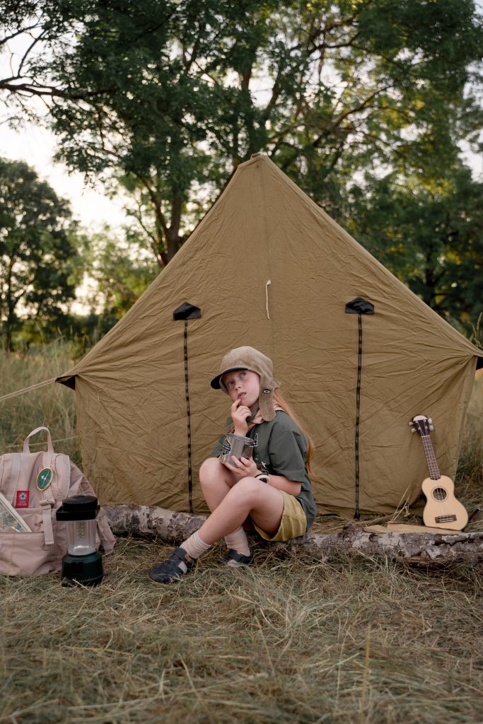 girl thinking on campsite